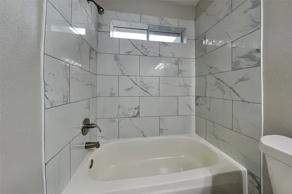 a bathroom with a bathtub