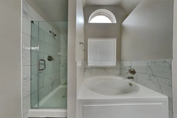 a close view of a bathtub in bathroom