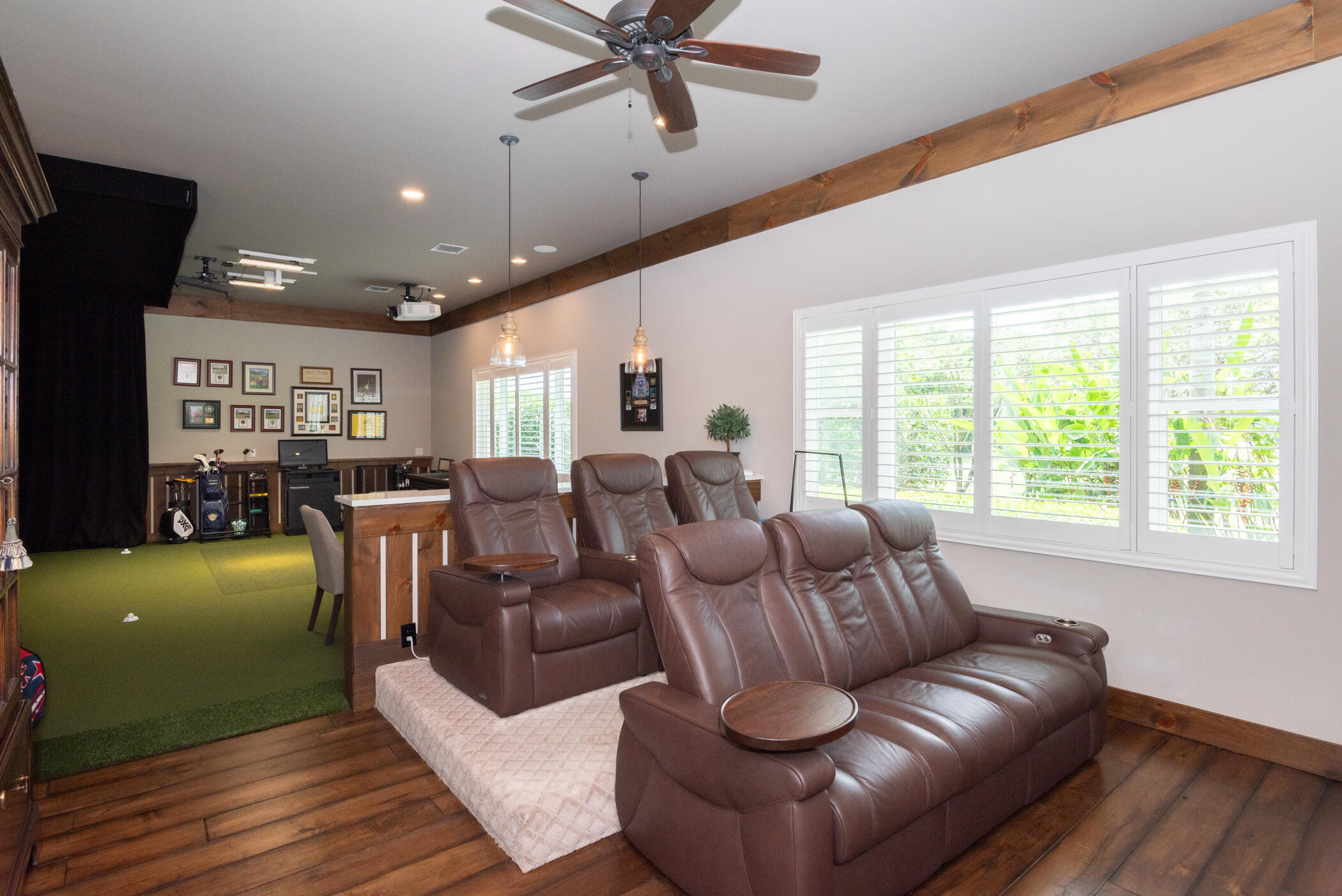 3420 Southeast Golf Trail Stuart, FL 34997 - Photo 18 of 63 a living room with furniture and a large window