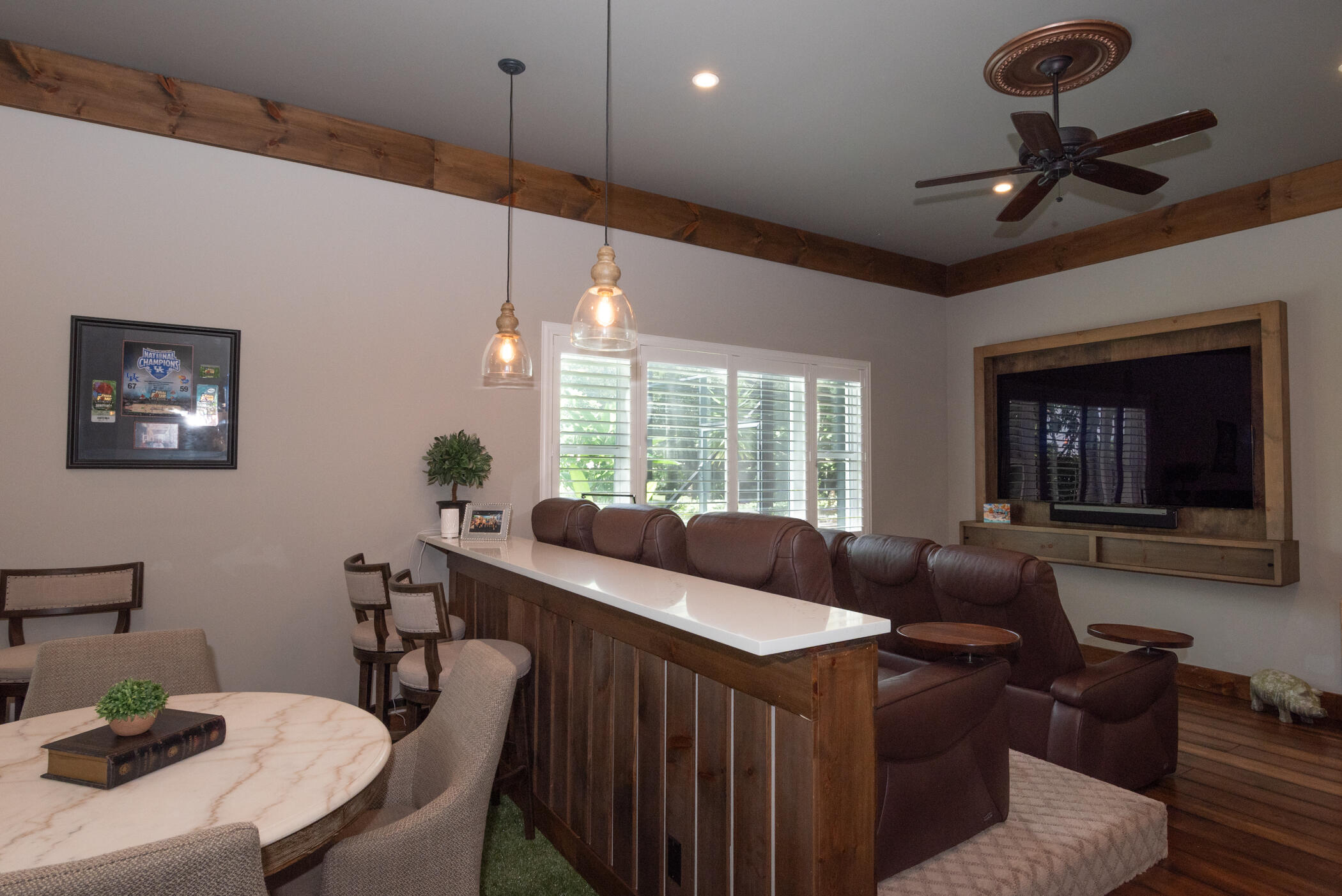3420 Southeast Golf Trail Stuart, FL 34997 - Photo 19 of 63 a living room with furniture and a large window