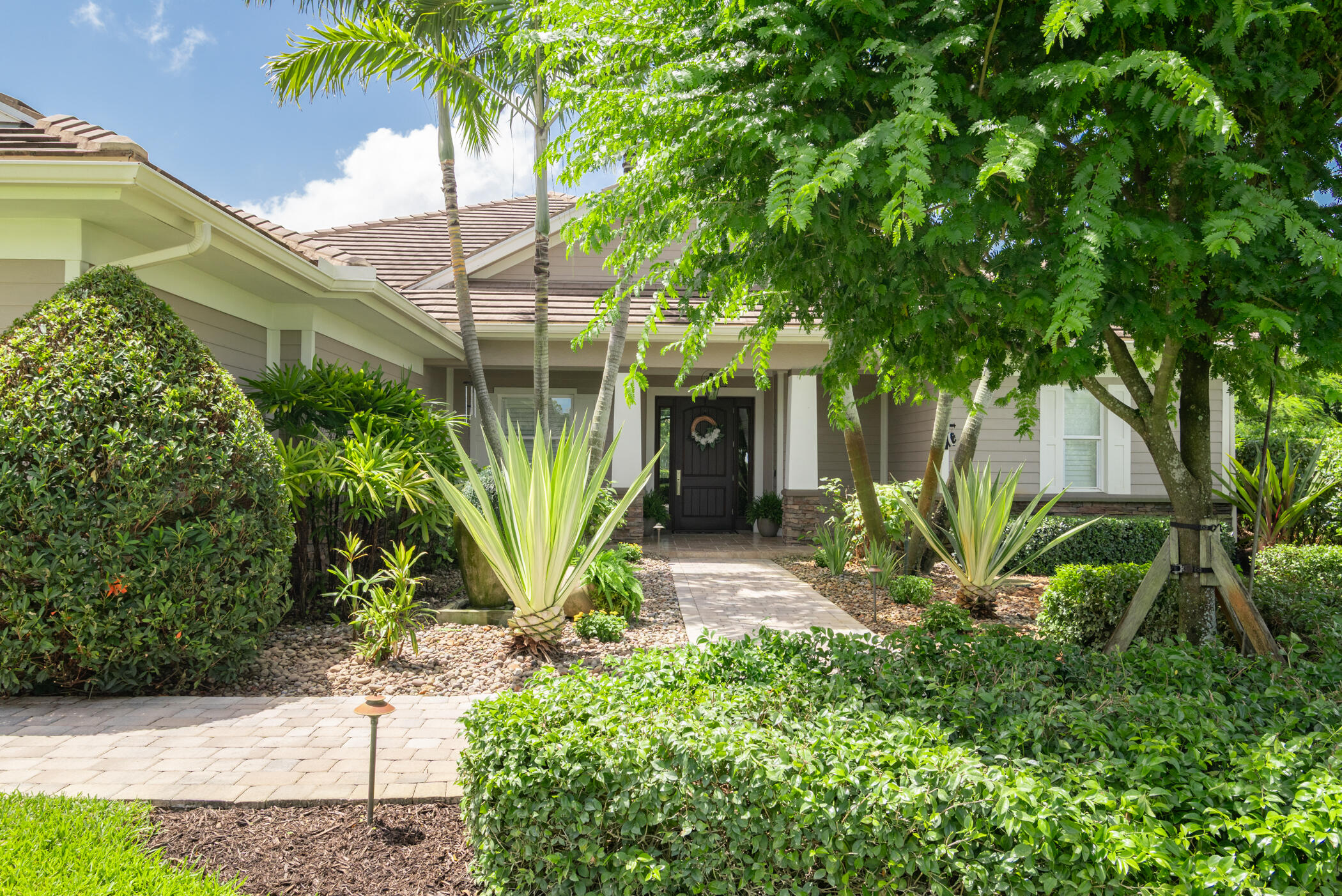 3420 Southeast Golf Trail Stuart, FL 34997 - Photo 2 of 63 a view of a garden