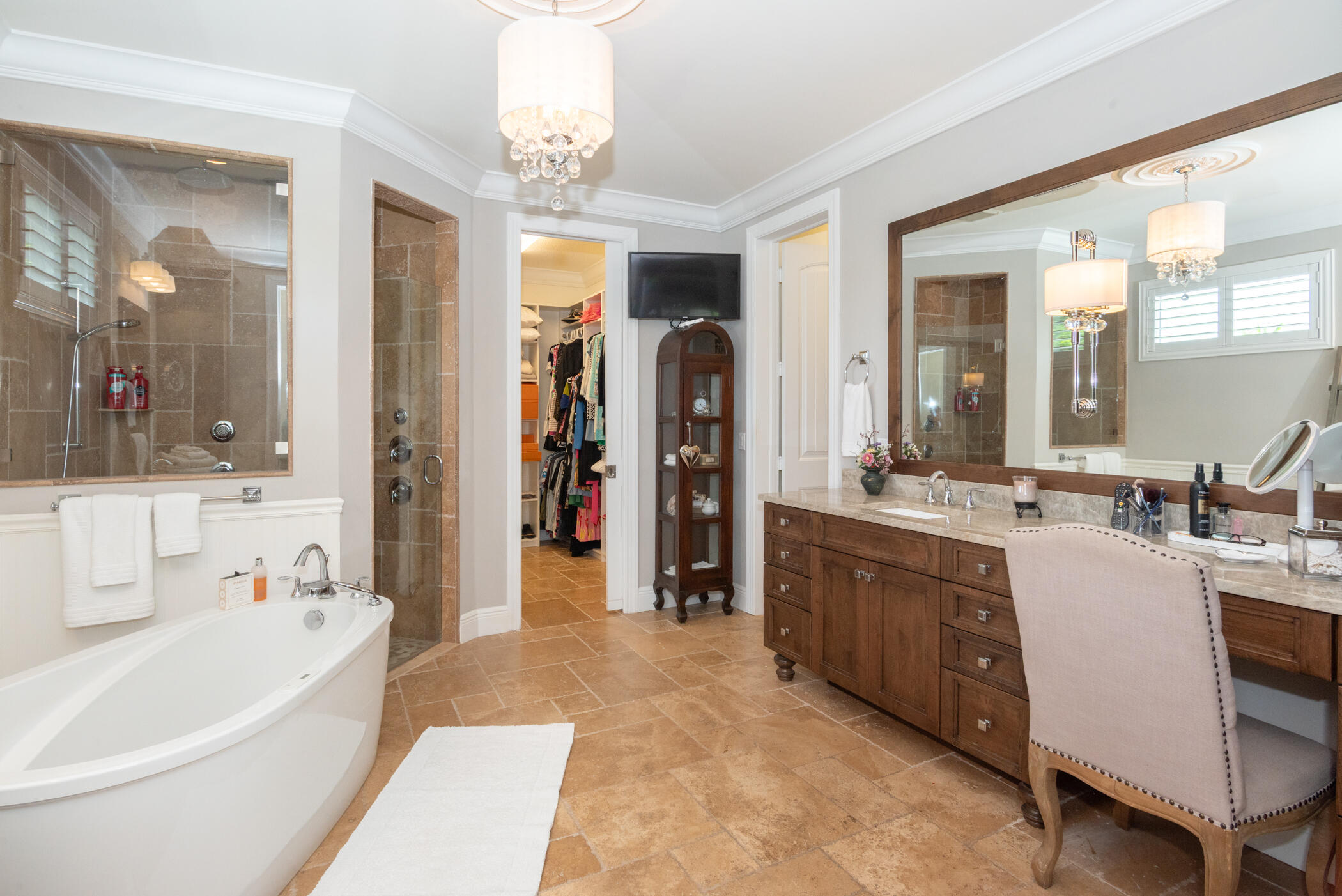 3420 Southeast Golf Trail Stuart, FL 34997 - Photo 28 of 63 a large spacious bathroom with a tub sink and mirror