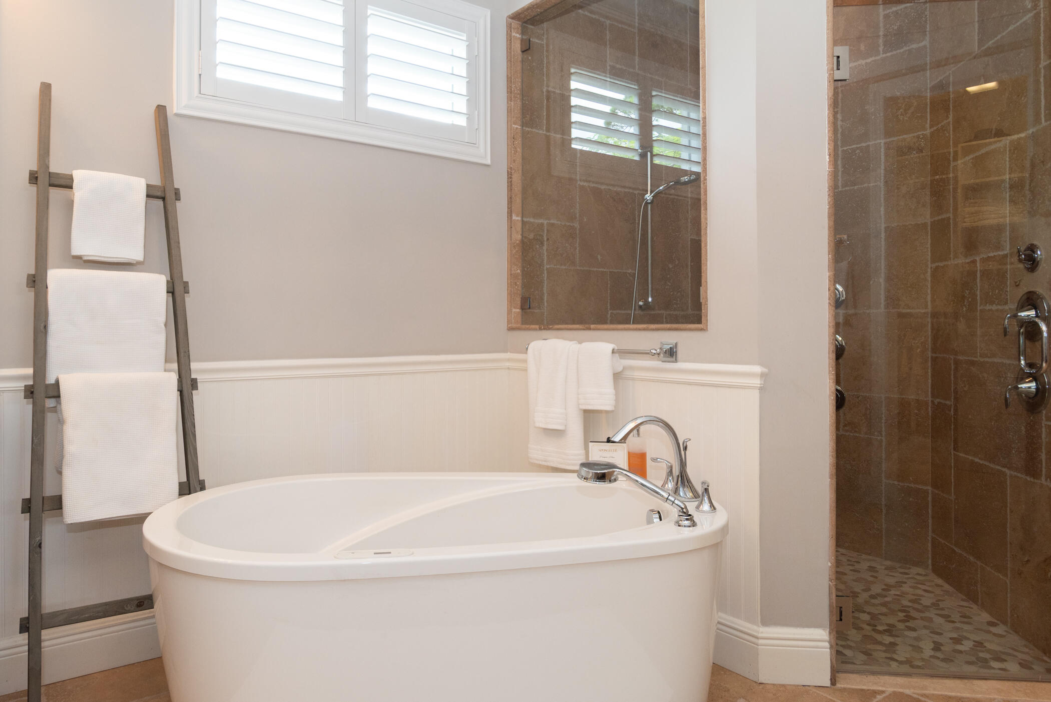 3420 Southeast Golf Trail Stuart, FL 34997 - Photo 29 of 63 a white bath tub sitting next to a white sink