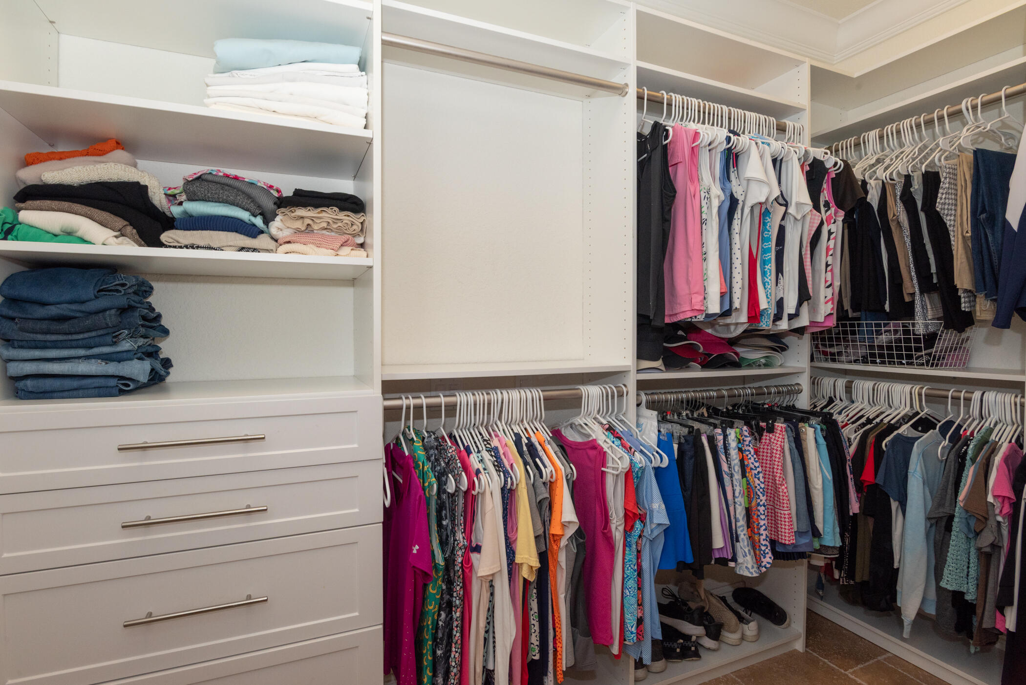 3420 Southeast Golf Trail Stuart, FL 34997 - Photo 32 of 63 a view of walk in closet with clothes