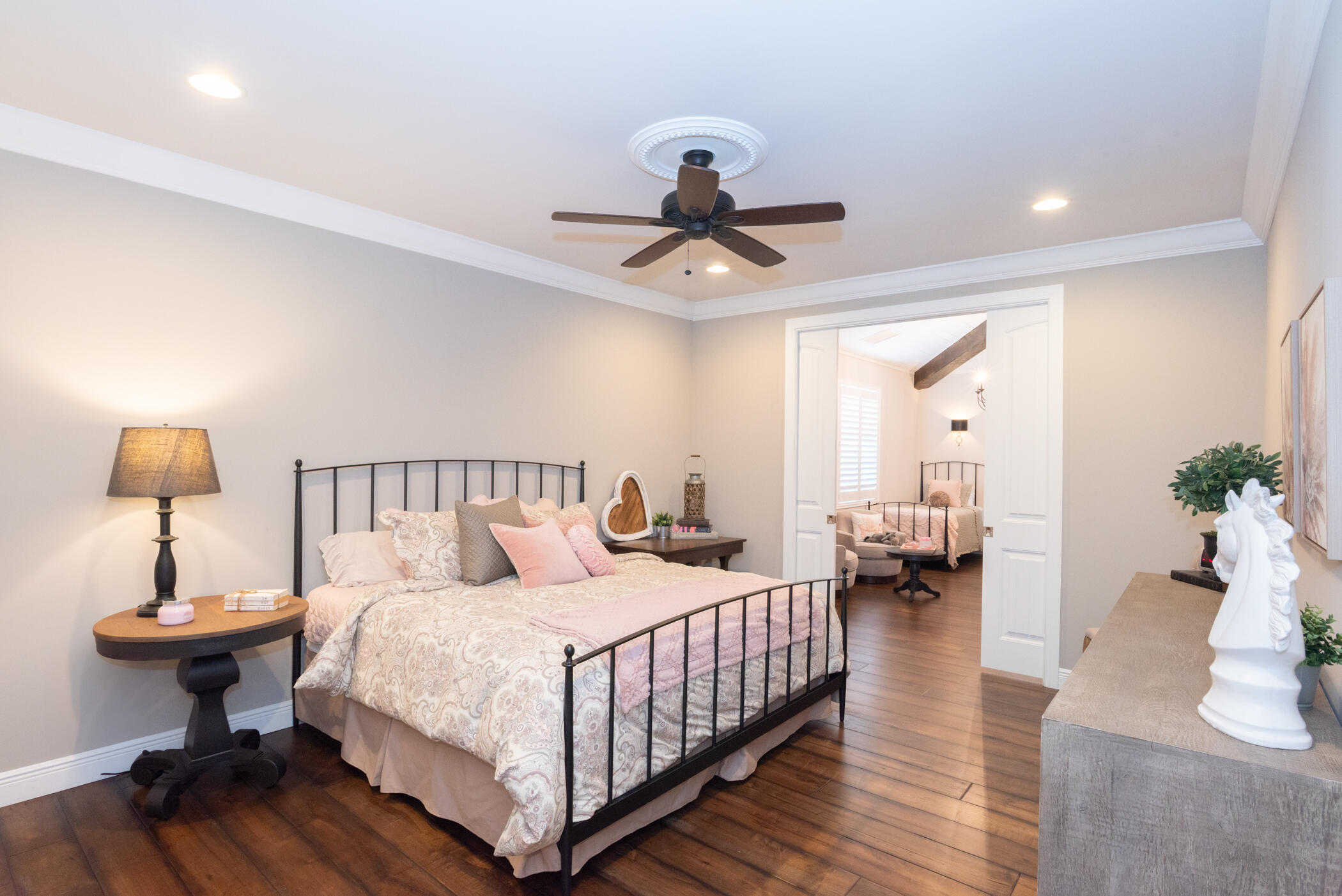 3420 Southeast Golf Trail Stuart, FL 34997 - Photo 34 of 63 a bedroom with a bed and wooden floor