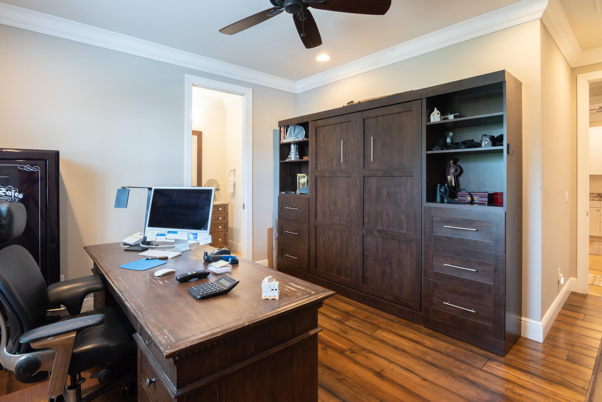 3420 Southeast Golf Trail Stuart, FL 34997 - Photo 39 of 63 a view of a workspace with furniture and wooden floor