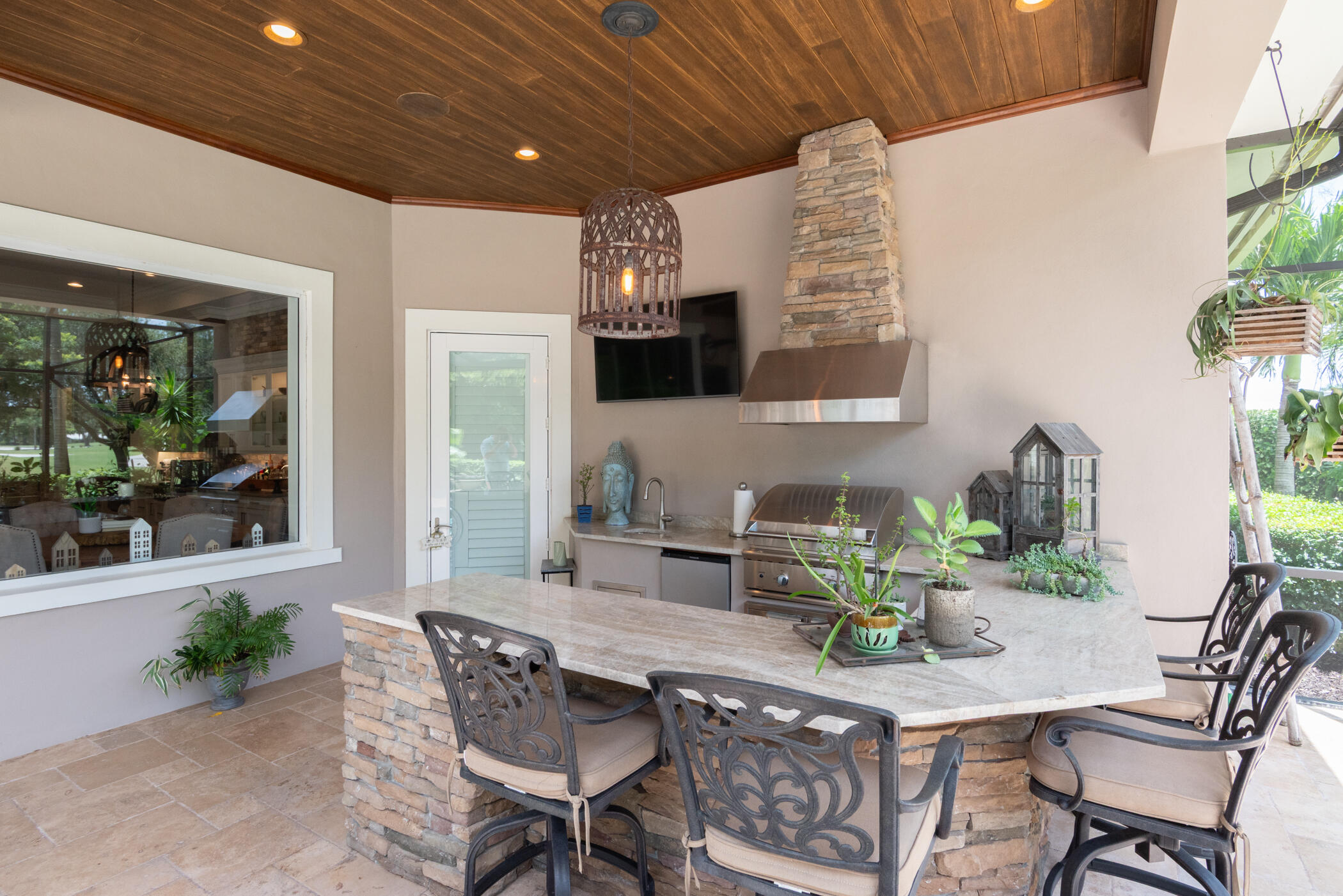 3420 Southeast Golf Trail Stuart, FL 34997 - Photo 45 of 63 a dining room with furniture and window