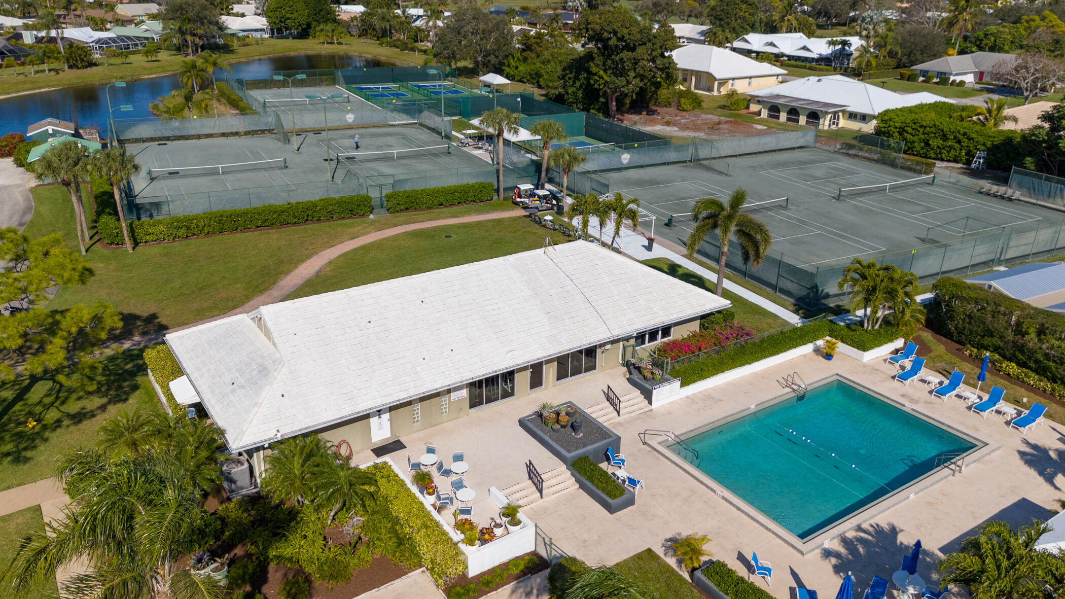 3420 Southeast Golf Trail Stuart, FL 34997 - Photo 63 of 63 an aerial view of a house with a garden