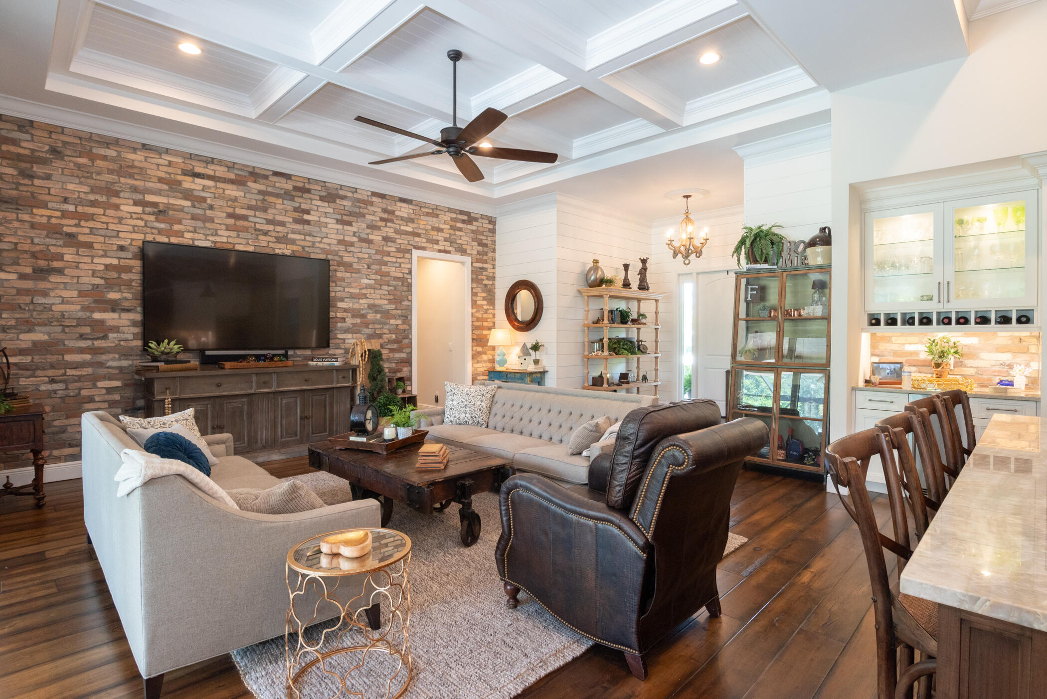 3420 Southeast Golf Trail Stuart, FL 34997 - Photo 9 of 63 a living room with fireplace furniture and a flat screen tv