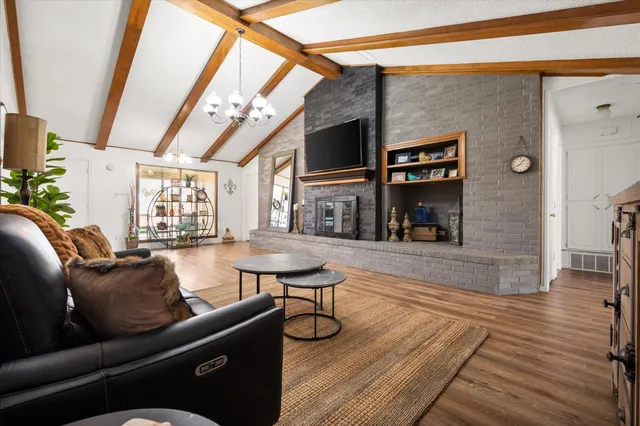 a view of fireplace and living room
