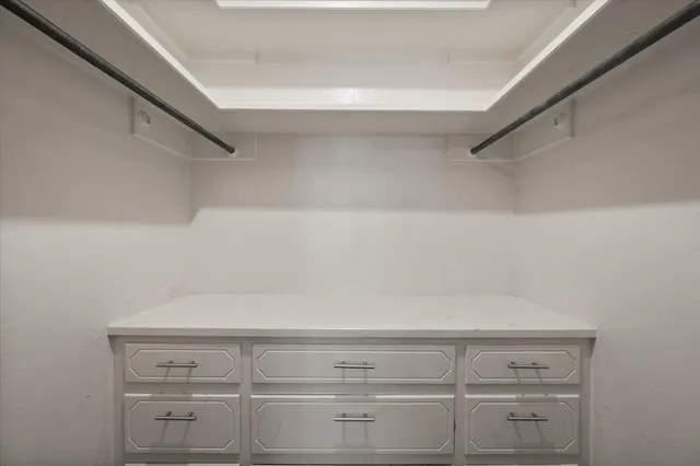 a view of a livingroom with furniture and a rug