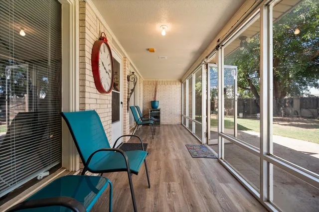 a view of house with backyard