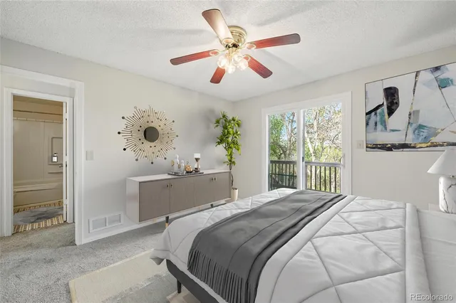 a view of a chandelier fan in a room