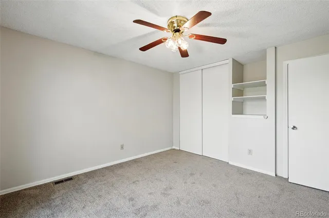 an aerial view of a house with outdoor space and lake view