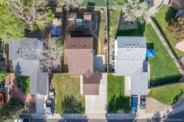 an aerial view of a house with a garden