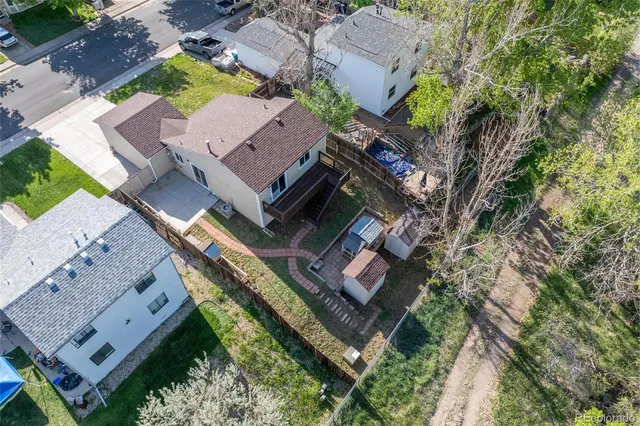 a view of a house with a yard and garage
