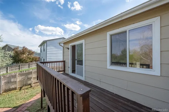 a view of a porch with seating space