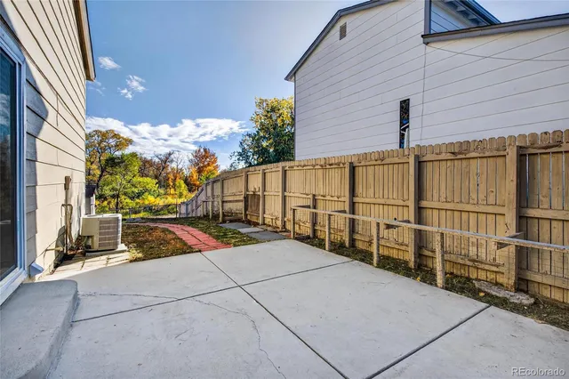 a view of a back yard of the house