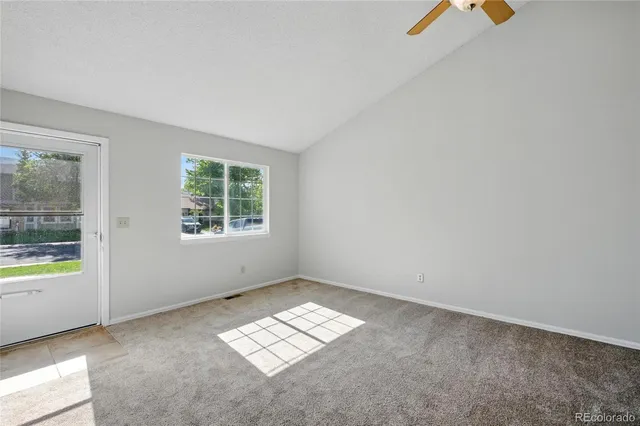 an empty room with windows