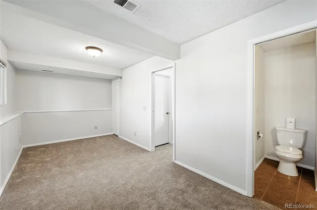 a view of a room with an empty space