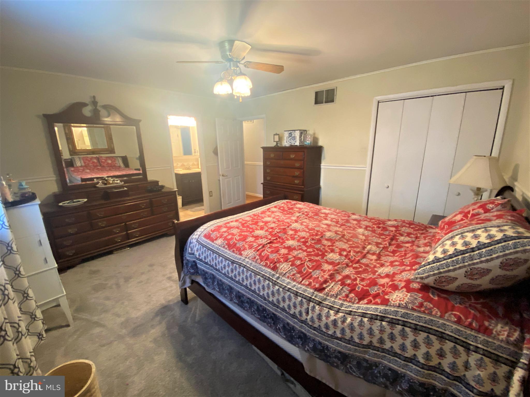 631 Walton Road Huntingtown, MD 20639 - Photo 20 of 34 Master bedroom w/ceiling fan and new carpet