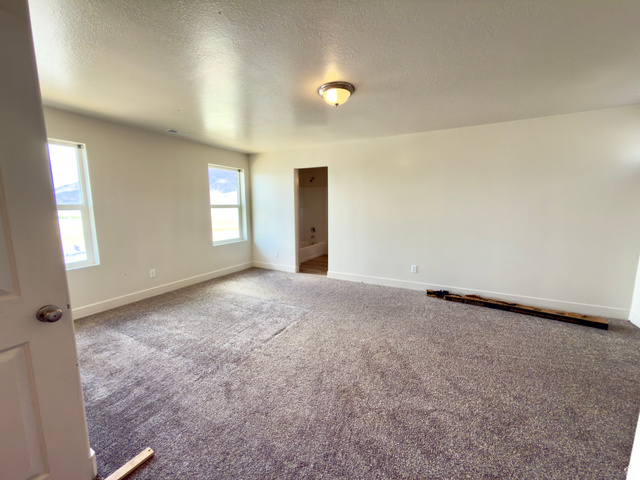 1823 South Longview Road Santaquin, UT 84655 - Photo 47 of 69 Spacious room featuring neutral carpeting and light-toned walls