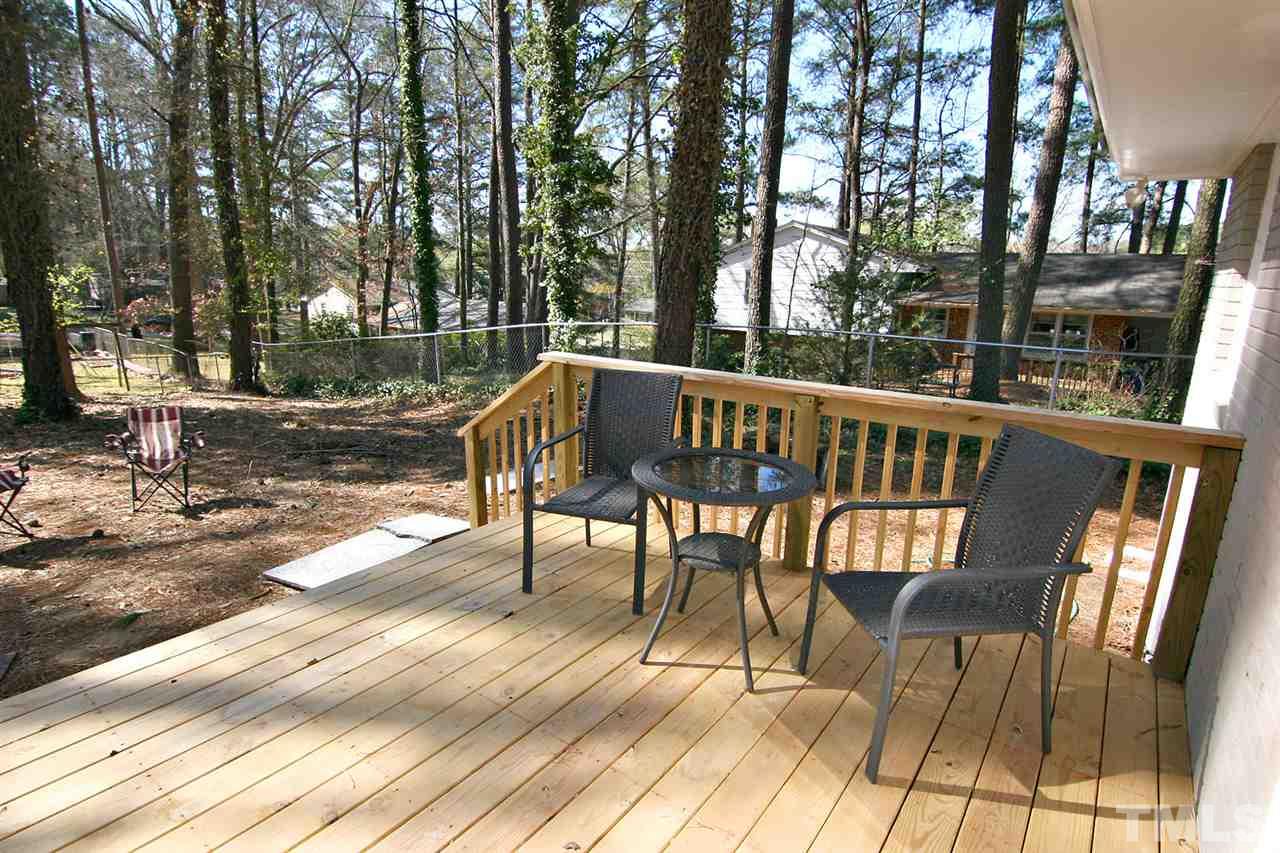 3404 Victor Place Raleigh, NC 27604 - Photo 21 of 22 a view of a chairs and table on the deck
