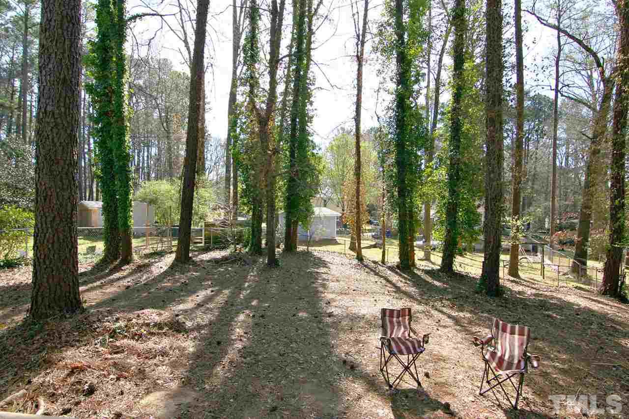 3404 Victor Place Raleigh, NC 27604 - Photo 22 of 22 a view of outdoor space with lots of trees