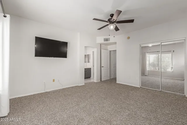 a view of a livingroom with a flat screen tv