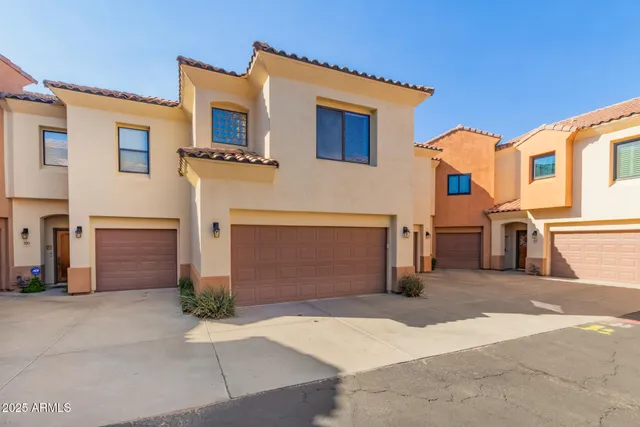 a view of a house with a street