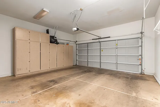 a view of a garage with cabinet