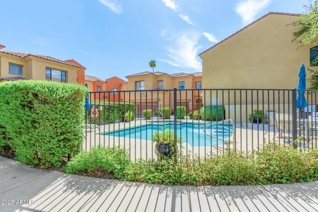 a view of a houses with a street