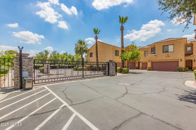 a view of a street with a building in the background