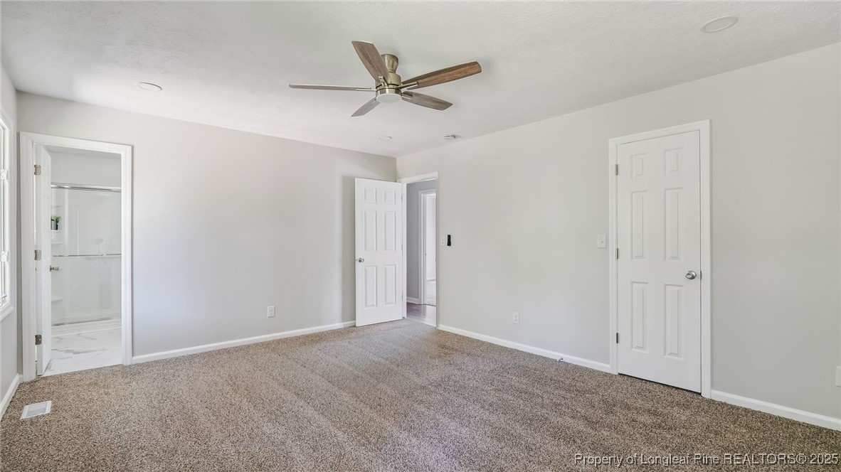 316 Patterson Street Raeford, NC 28376 - Photo 18 of 39 a view of a livingroom with a ceiling fan