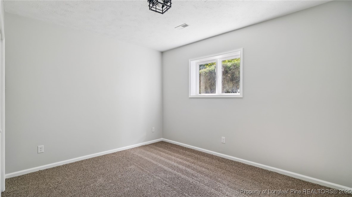 316 Patterson Street Raeford, NC 28376 - Photo 28 of 39 an empty room with a window