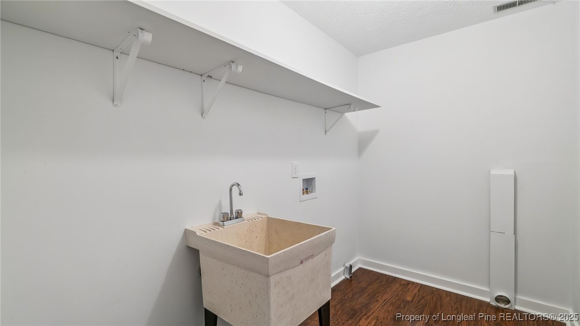 316 Patterson Street Raeford, NC 28376 - Photo 31 of 39 a utility room with a sink