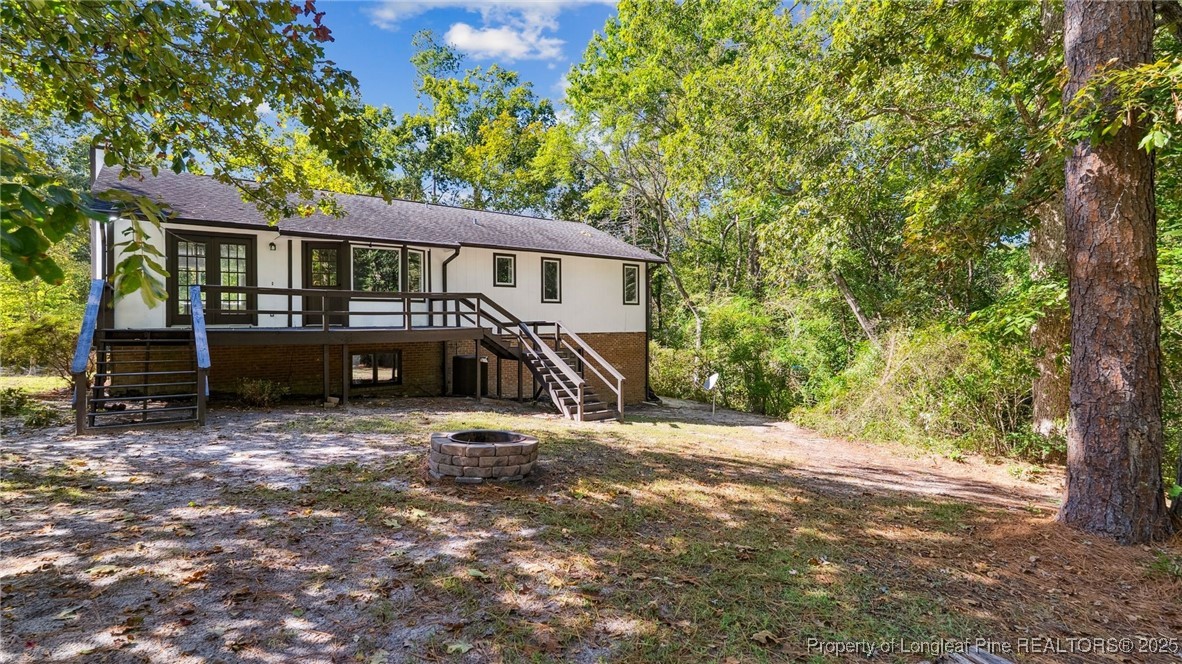 316 Patterson Street Raeford, NC 28376 - Photo 38 of 39 a view of a house with a yard and large tree
