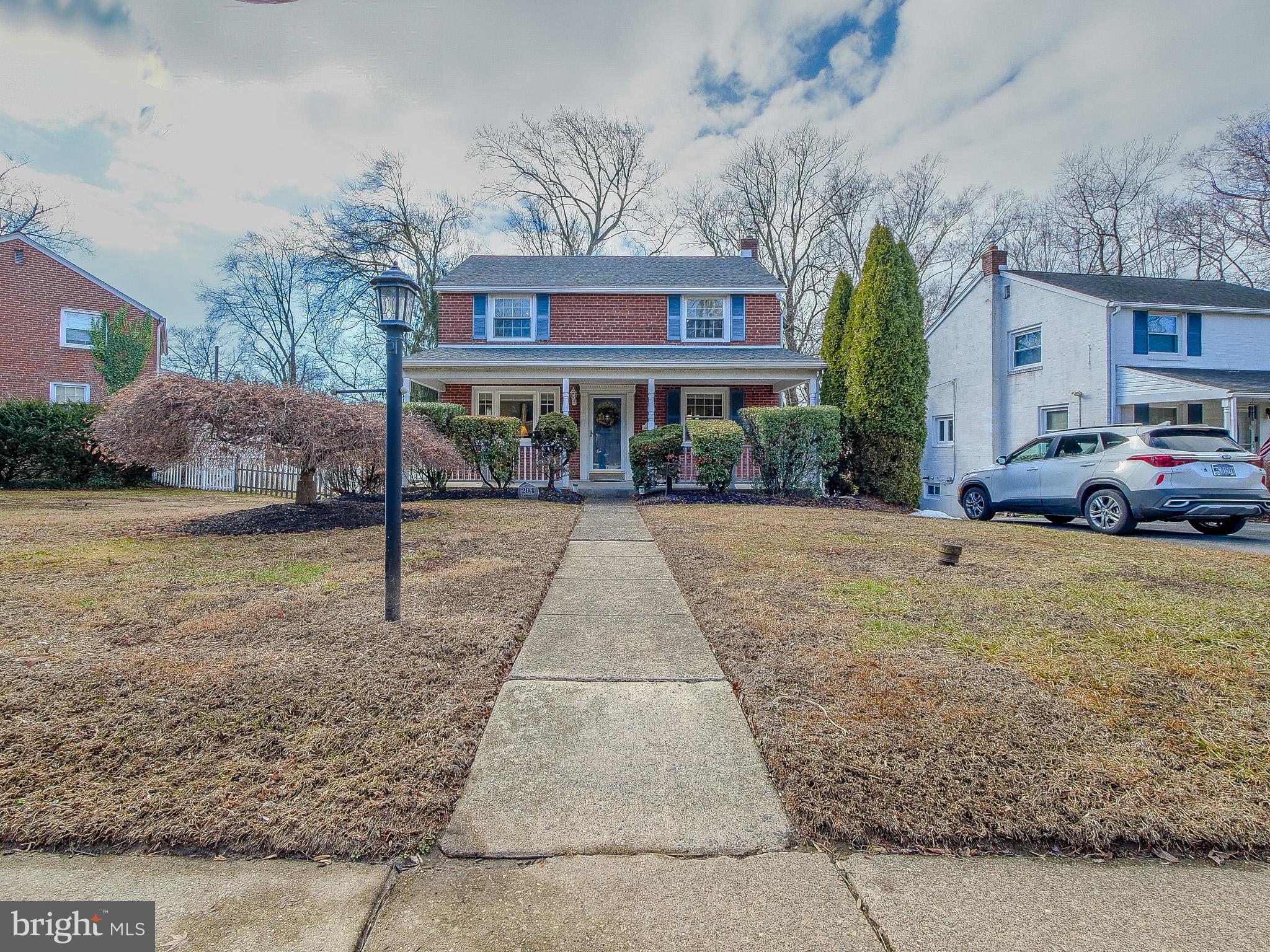 204 East Thomson Avenue Springfield, PA 19064 - Photo 1 of 58 a front view of a house with a yard