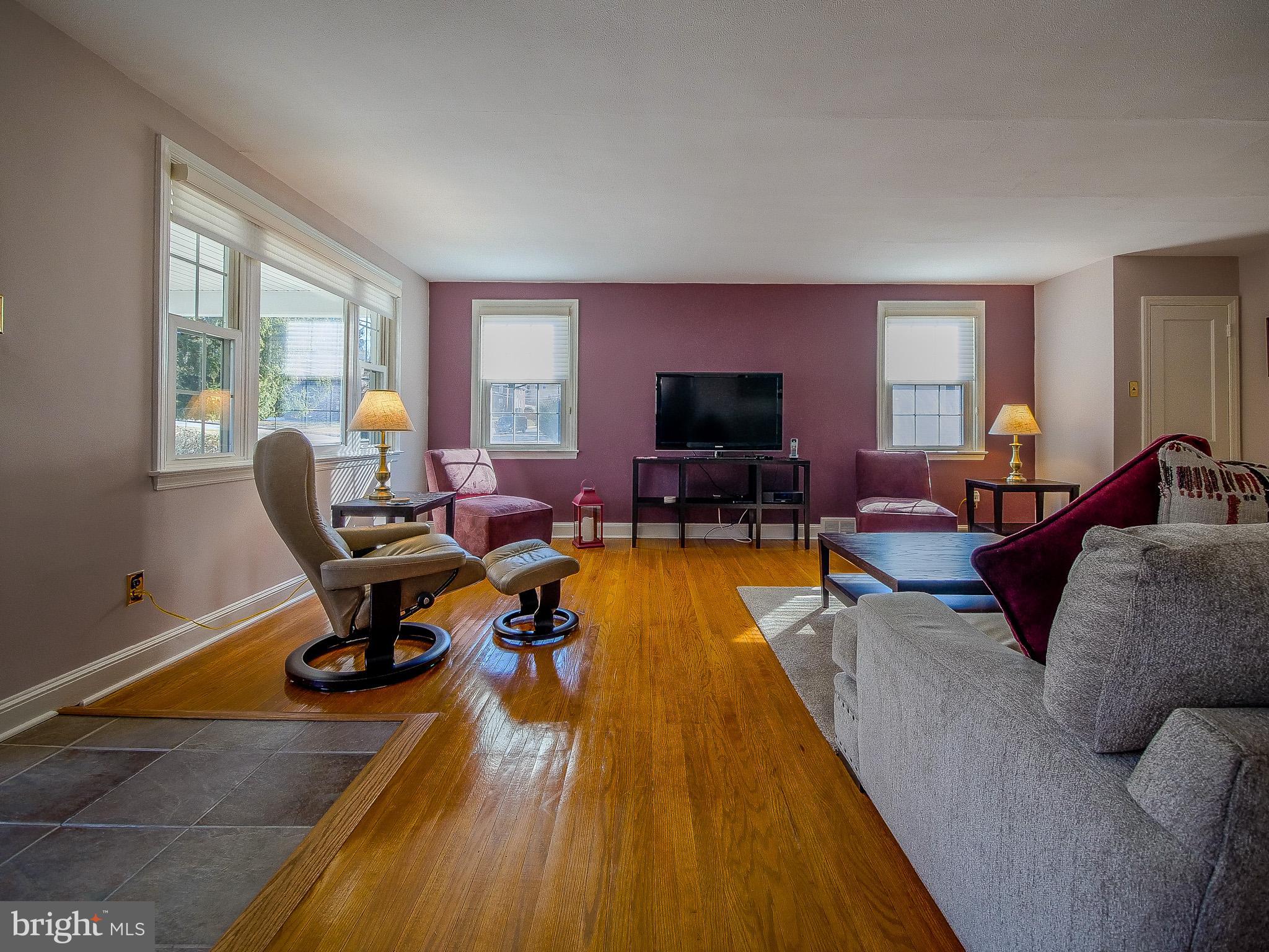 204 East Thomson Avenue Springfield, PA 19064 - Photo 11 of 58 a living room with furniture and a flat screen tv