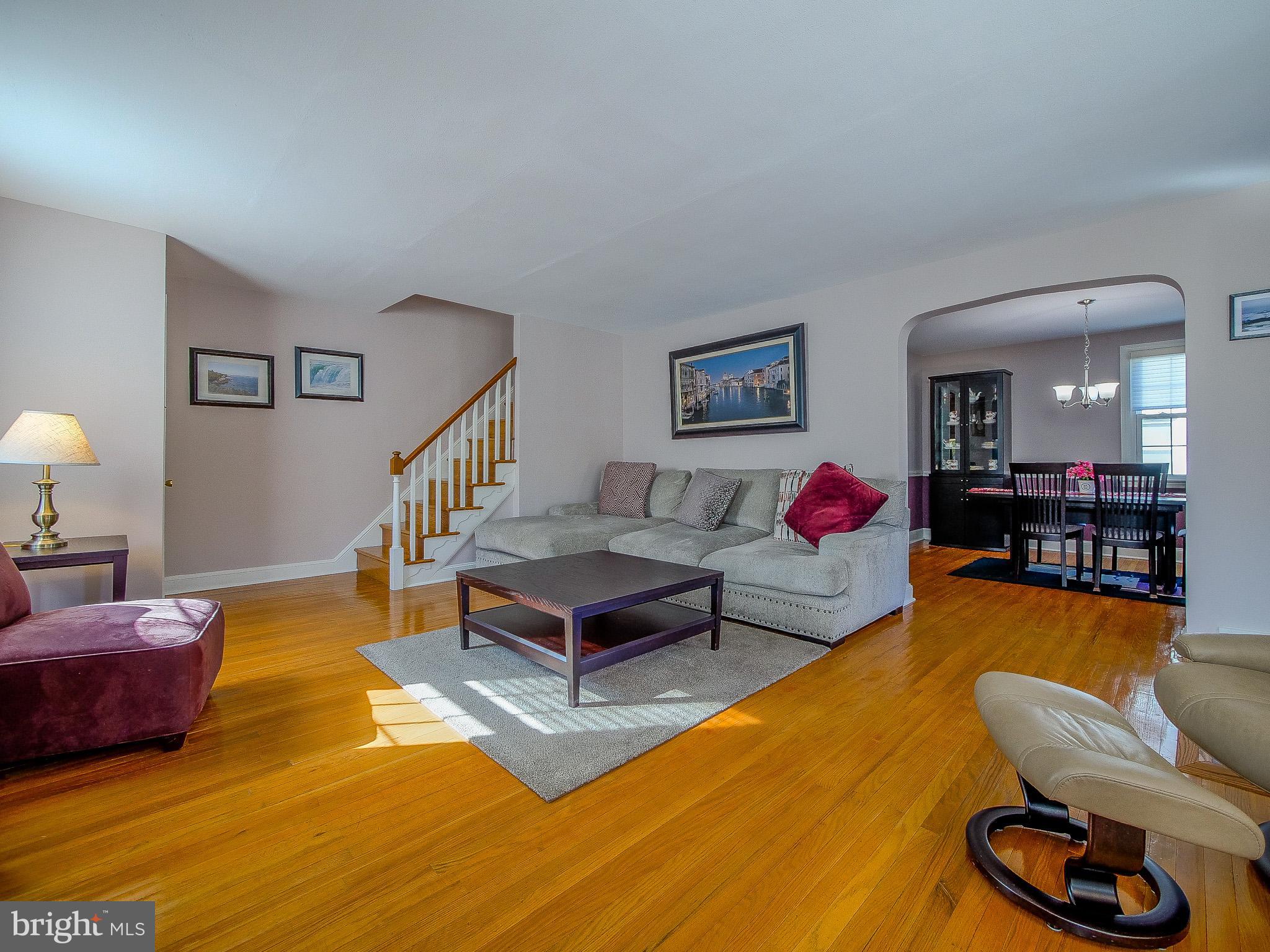 204 East Thomson Avenue Springfield, PA 19064 - Photo 13 of 58 a living room with furniture and a wooden floor