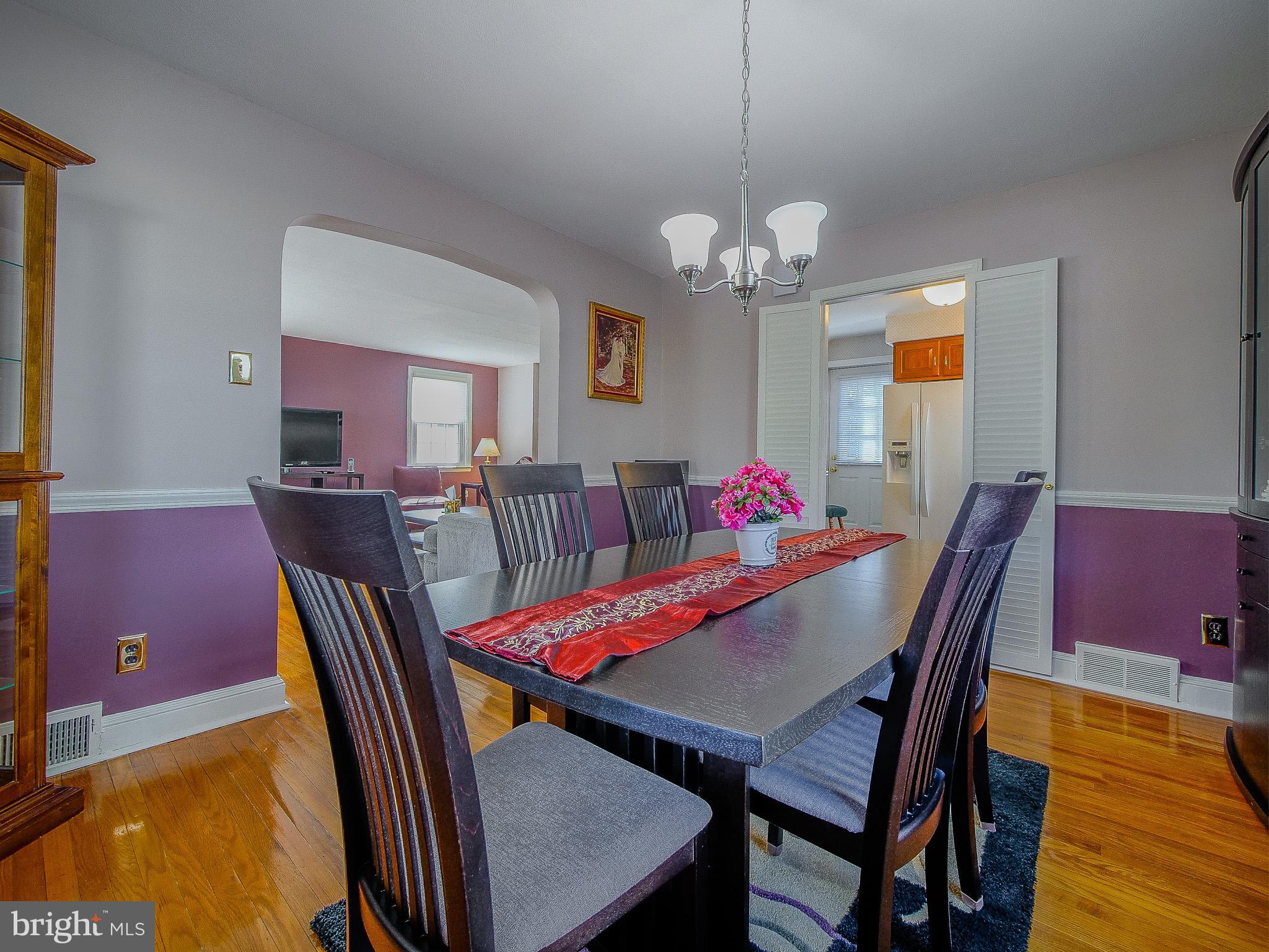 204 East Thomson Avenue Springfield, PA 19064 - Photo 17 of 58 a view of a dining room with furniture and chandelier