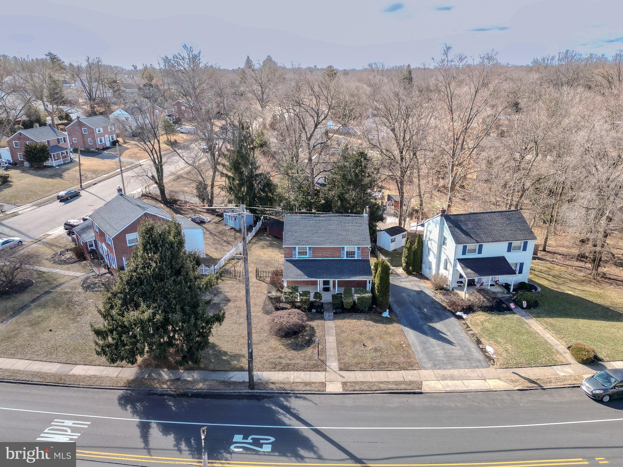 204 East Thomson Avenue Springfield, PA 19064 - Photo 2 of 58 an aerial view of a house with yard and trees