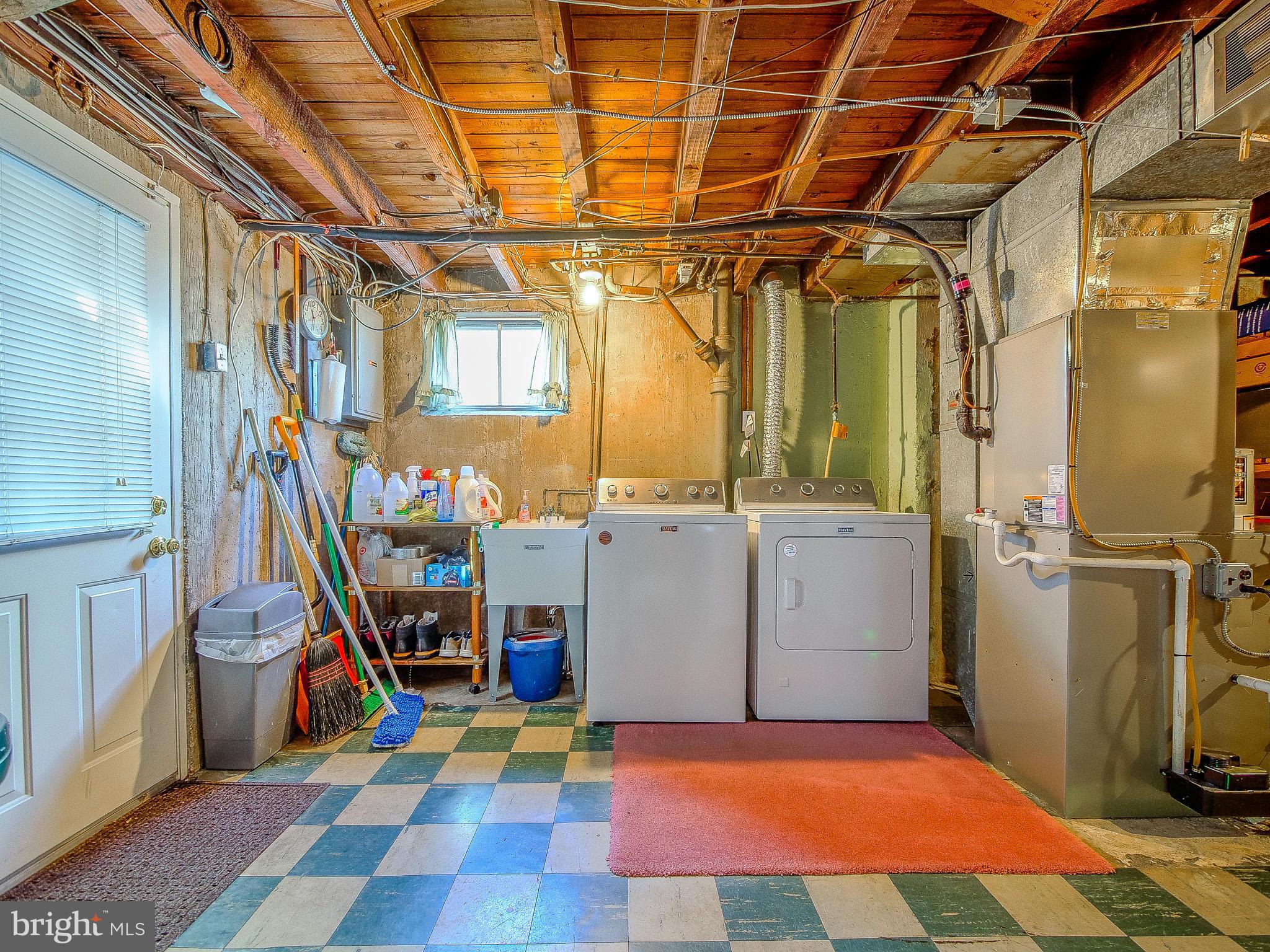 204 East Thomson Avenue Springfield, PA 19064 - Photo 47 of 58 a utility room with dryer and washer