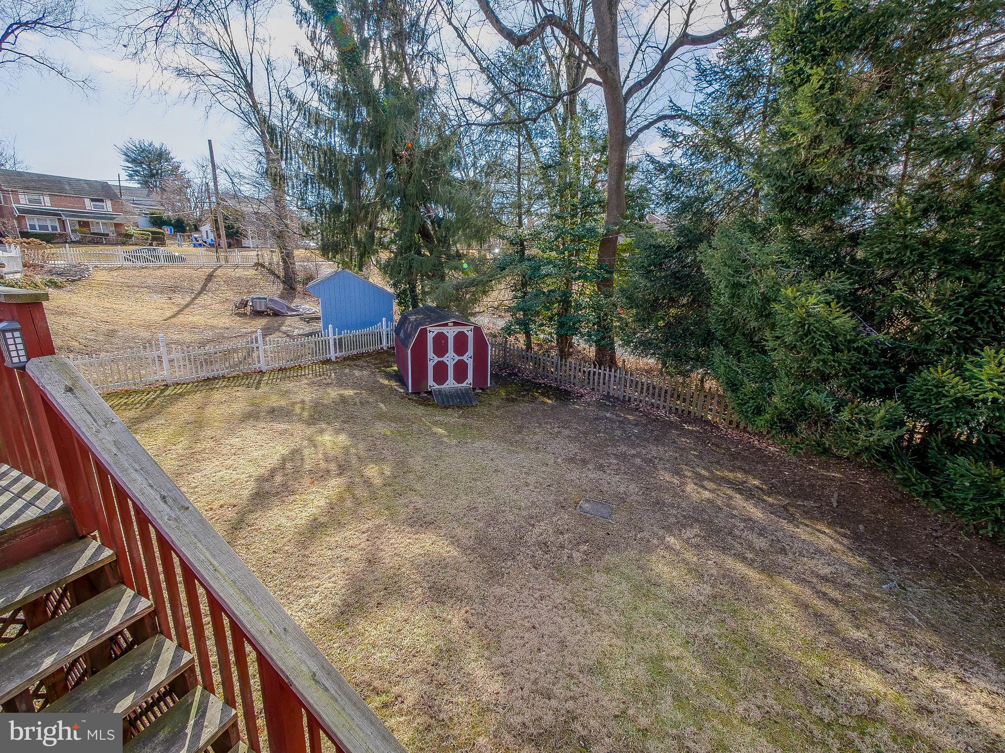 204 East Thomson Avenue Springfield, PA 19064 - Photo 51 of 58 a view of a backyard with wooden fence