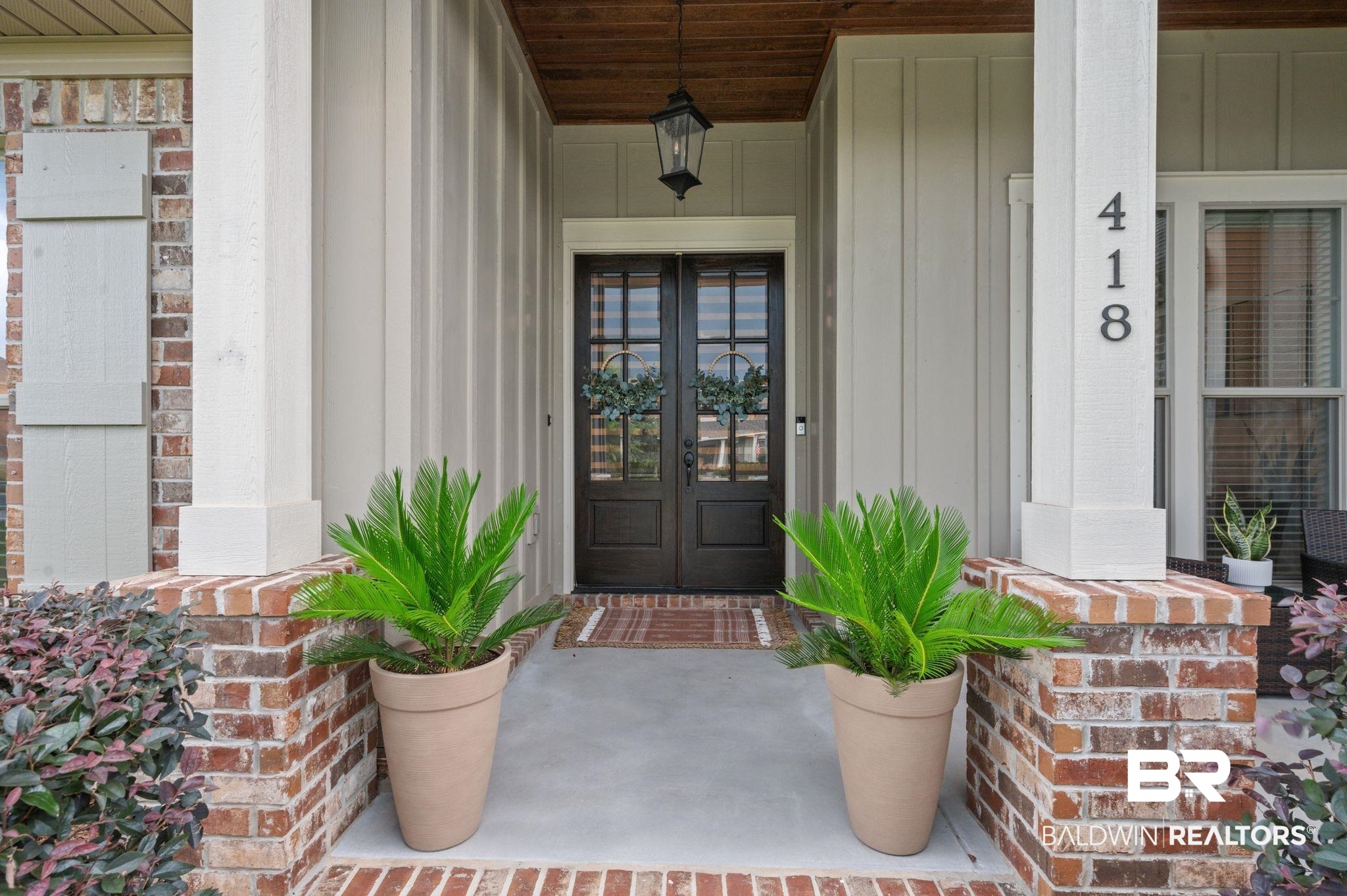 418 Fortune Drive Fairhope, AL 36532 - Photo 3 of 63 Doorway to property featuring covered porch