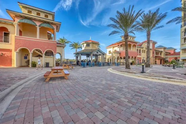 a view of a building with sitting area