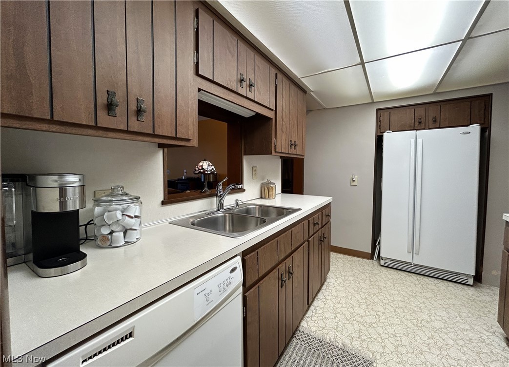 1748 Sunview Road Lyndhurst, OH 44124 - Photo 20 of 41 Kitchen with newer sink and faucet, white appliances included.