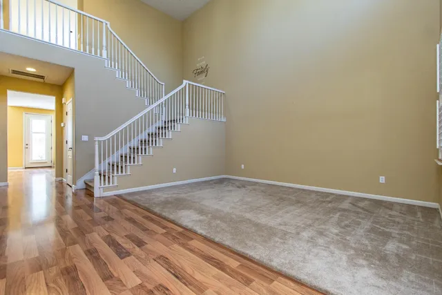 a view of livingroom with furniture and wooden floor