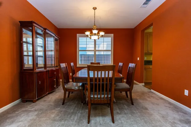 a view of a livingroom with furniture and window
