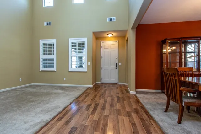 a view of a kitchen cabinets and wooden floor